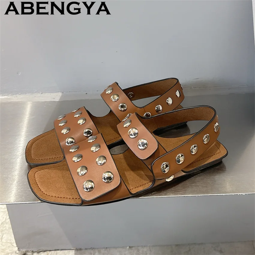 

2026 Summer New Rivet Inlay Flat Sandals for Women Round Toe Trendy Flat Sandals Summer Fashion Real Leather Beach Sandals Mujer