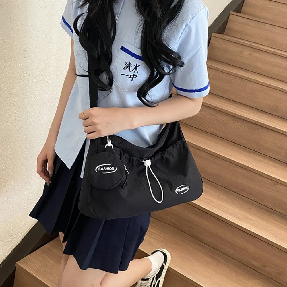 

Casual Nylon Shoulder Bag Large Capacity Zipper Drawstring Crossbody Bag Leightweight Solid Color Commuting Bag Minimalist