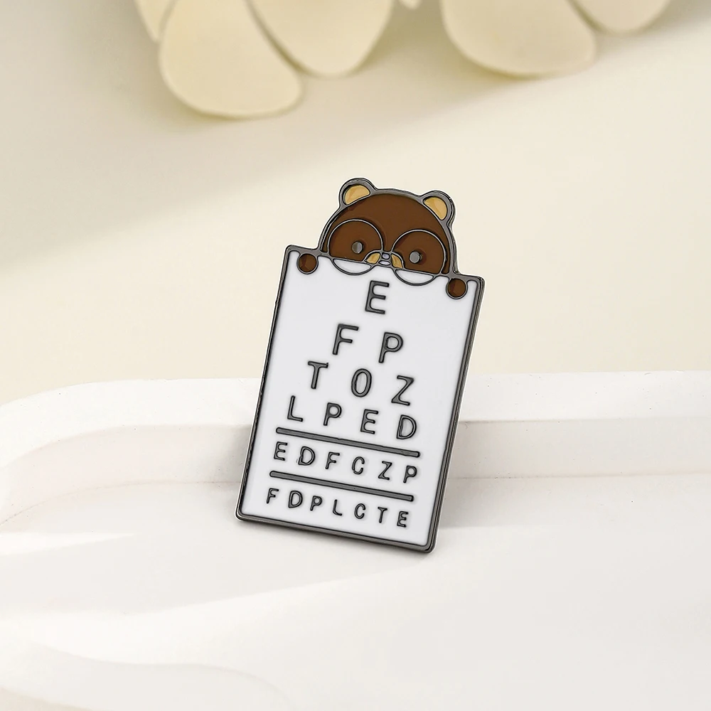 Hanreshe Bear and Vision Test Brooch Medical Ophthalmology Theme Lovely Animal Pin for Ophthalmologist Nurse Lapel Badge Gifts