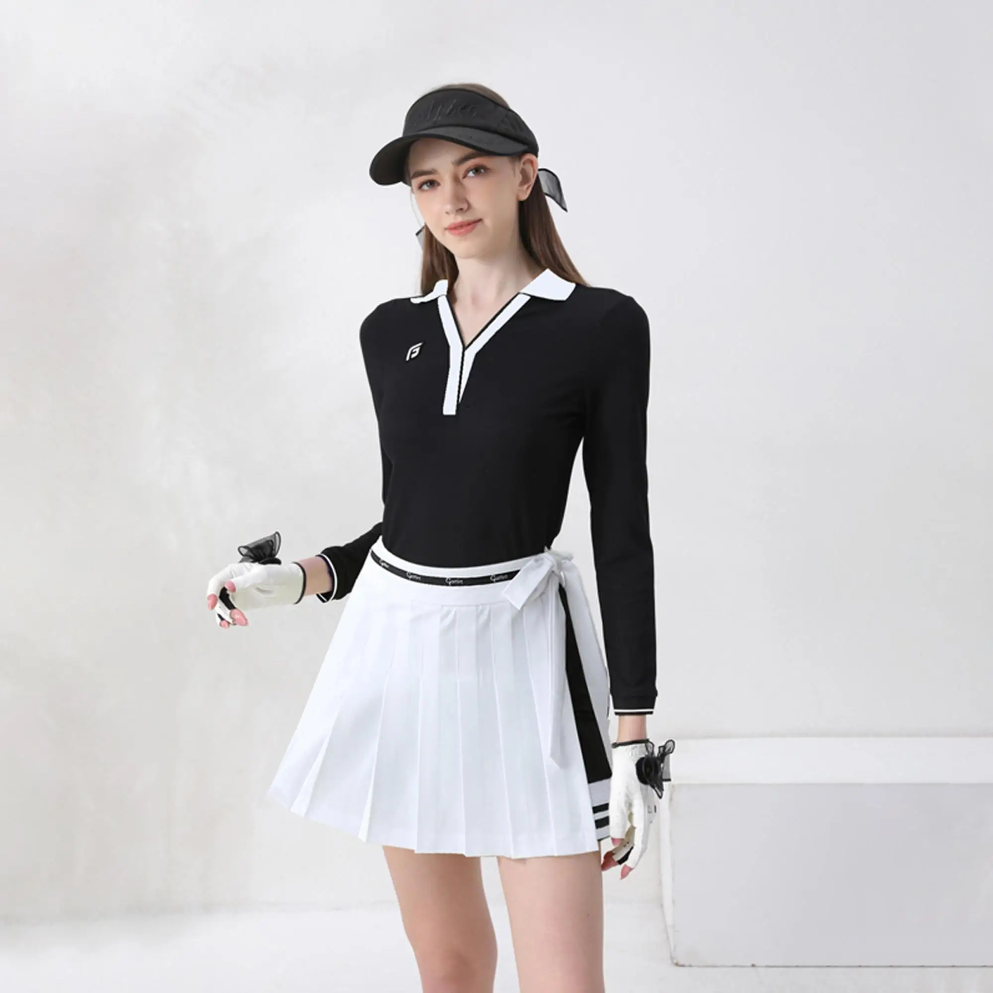 Ropa de golfista para mujer, camiseta de manga larga con cuello en V, Tops ajustados, faldas de golf plisadas con lazo, faldas pantalón de moda con pantalones cortos