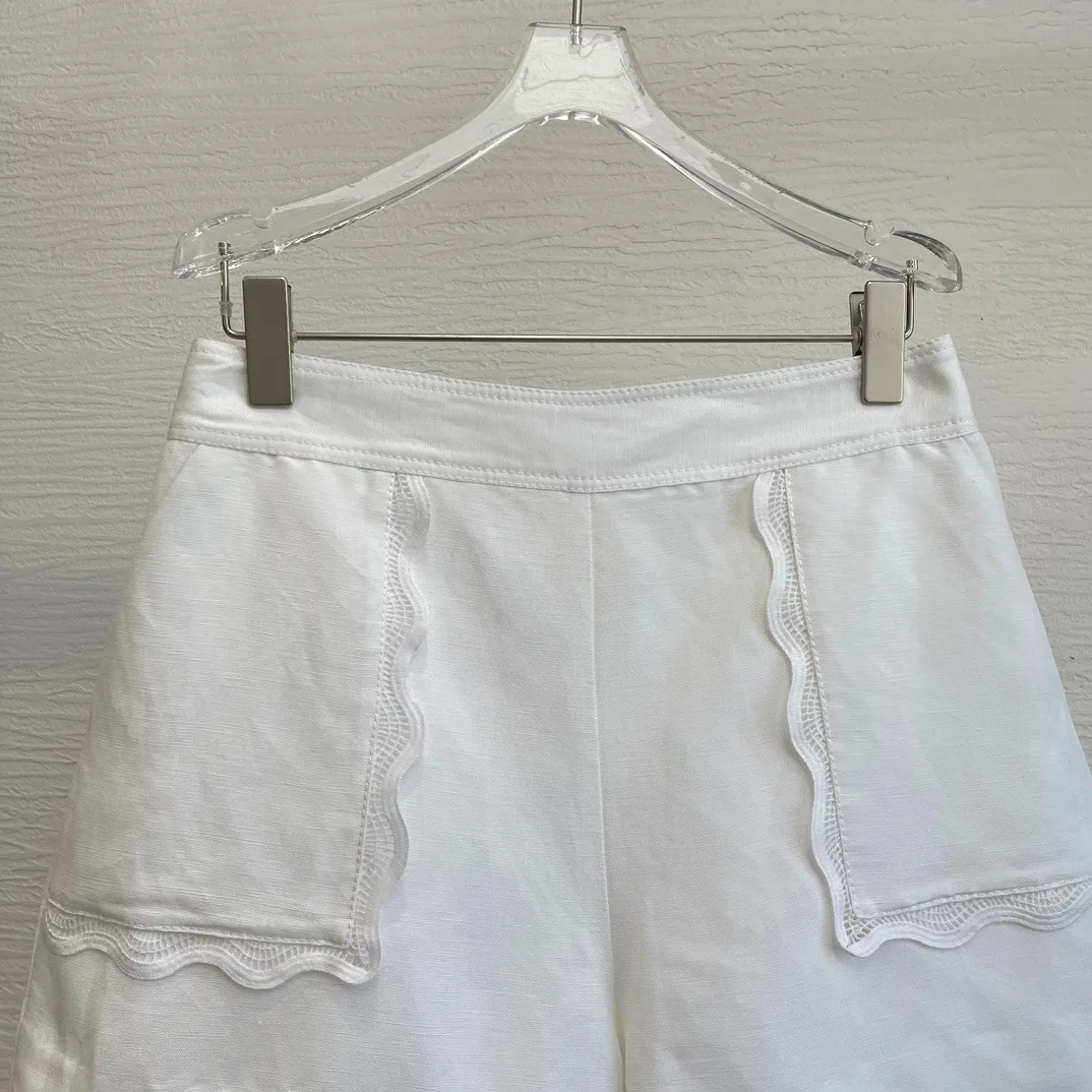 2024 New Summer Women Fashion White Lace Ruffles Pockets Folds Casual Shorts High Quality Collection Clothes