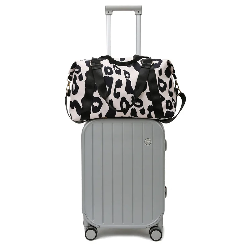 2024 Cow Pattern For traveling Female bags Large Capacity Travel Weekend bag Black Pink big luggage bag Fashion Fitness bag