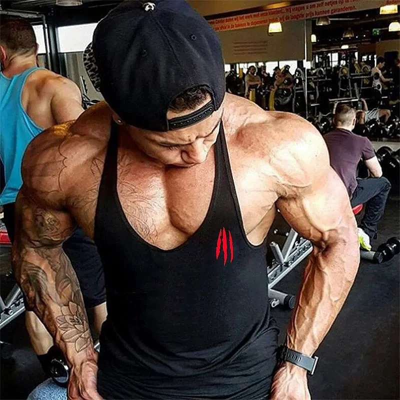 

Men's Gym Stringer for Bodybuilding - Sleeveless Fitness Top, Muscular Fit T-Shirt Style Vests