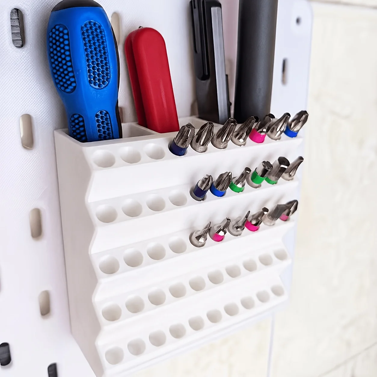 A Pegboard Drill Bit Holder with 40 Drill Bit Slots and 2 Screwdriver Bit Slots, A Wall-mounted Tool Organizer Storage Rack
