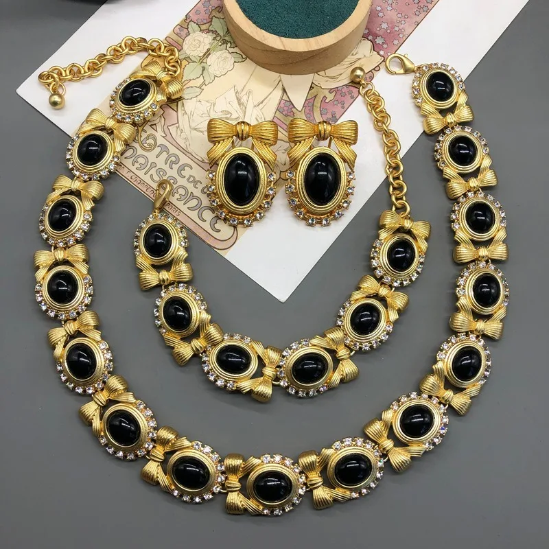 

Qingdao Medieval Jewelry Plated Real Gold Black Gold Necklace Stud Earrings Bracelet Set Temperament Elegant Heavy Industry