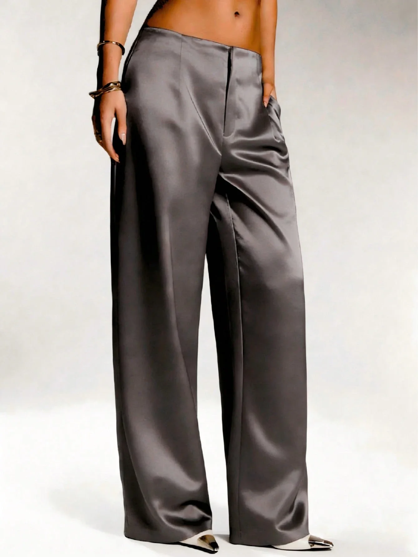 

Женские атласные однотонные брюки с широкими штанинами, карманами и застежкой-молнией