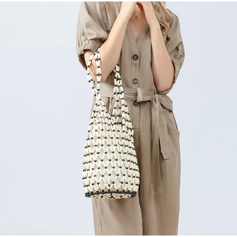 Holz Perle Gewebte Tasche Neue Design Marke frauen Hohl Perlen Meer Reise Vielseitige hand Schulter Unterarm Eimer Tasche – Detail 12