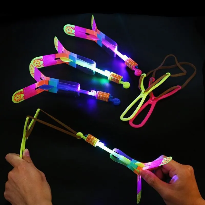 50/100/1000PCS Amazing Light Toy Arrow Rocket Helicopter Flying Toy LED Light Toys Party Fun Gift Rubber Band Catapult Wholesale