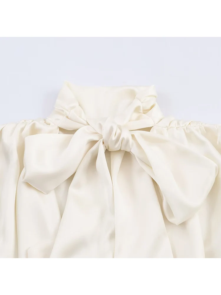 Bluzka damska TFMLN na jesień, z kokardą przy dekolcie, długie rękawy, dopasowany krój, elegancki styl, seksowny odkryty tył, koszula damska.