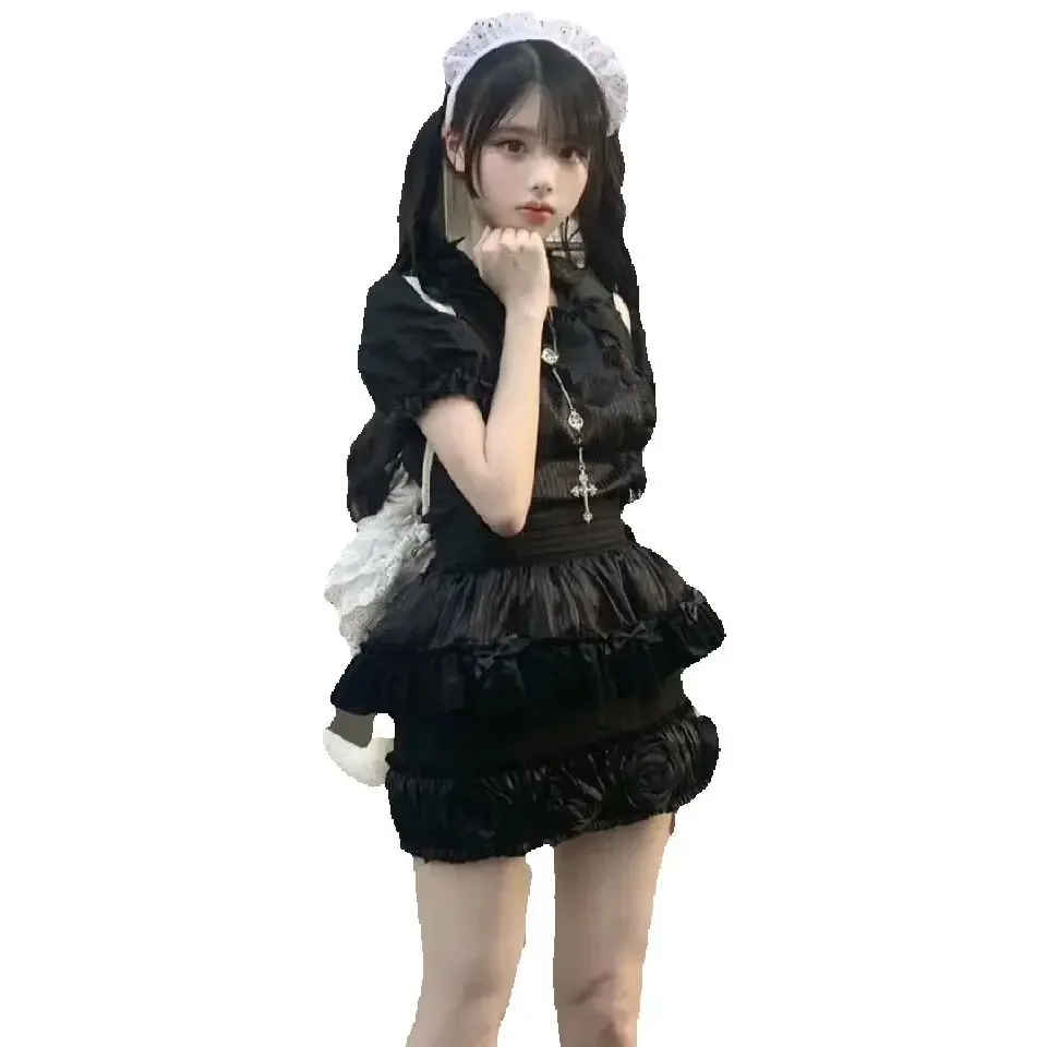 2025 Японский дизайн Лолита Топ и юбка на подтяжках Комплект для женщин и девочек Ретро рубашка с короткими рукавами с рюшами Юбка с бутоном цветка Комплект из 2 предметов