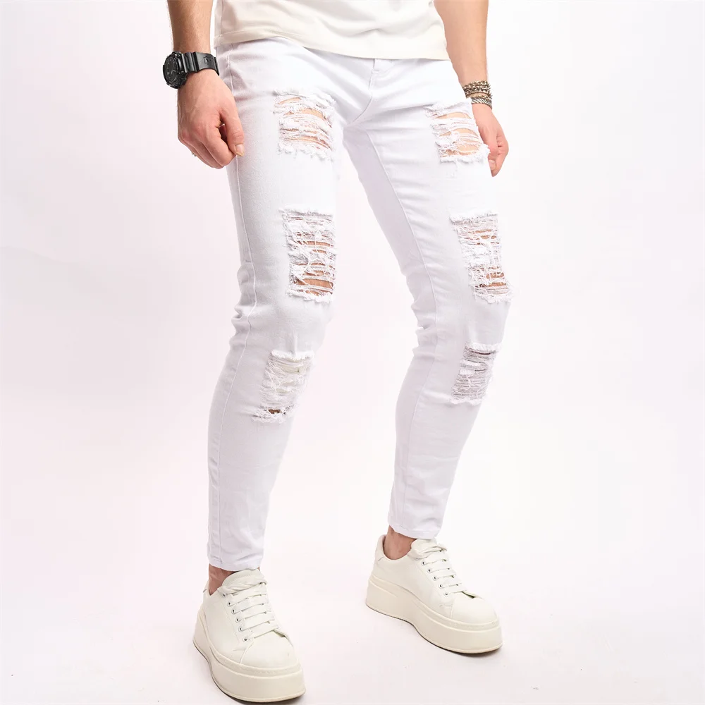 Eleganti fori Distressed Street Style uomo Jeans Skinny pantaloni Slim elasticizzati maschili pantaloni in Denim a matita strappati solidi