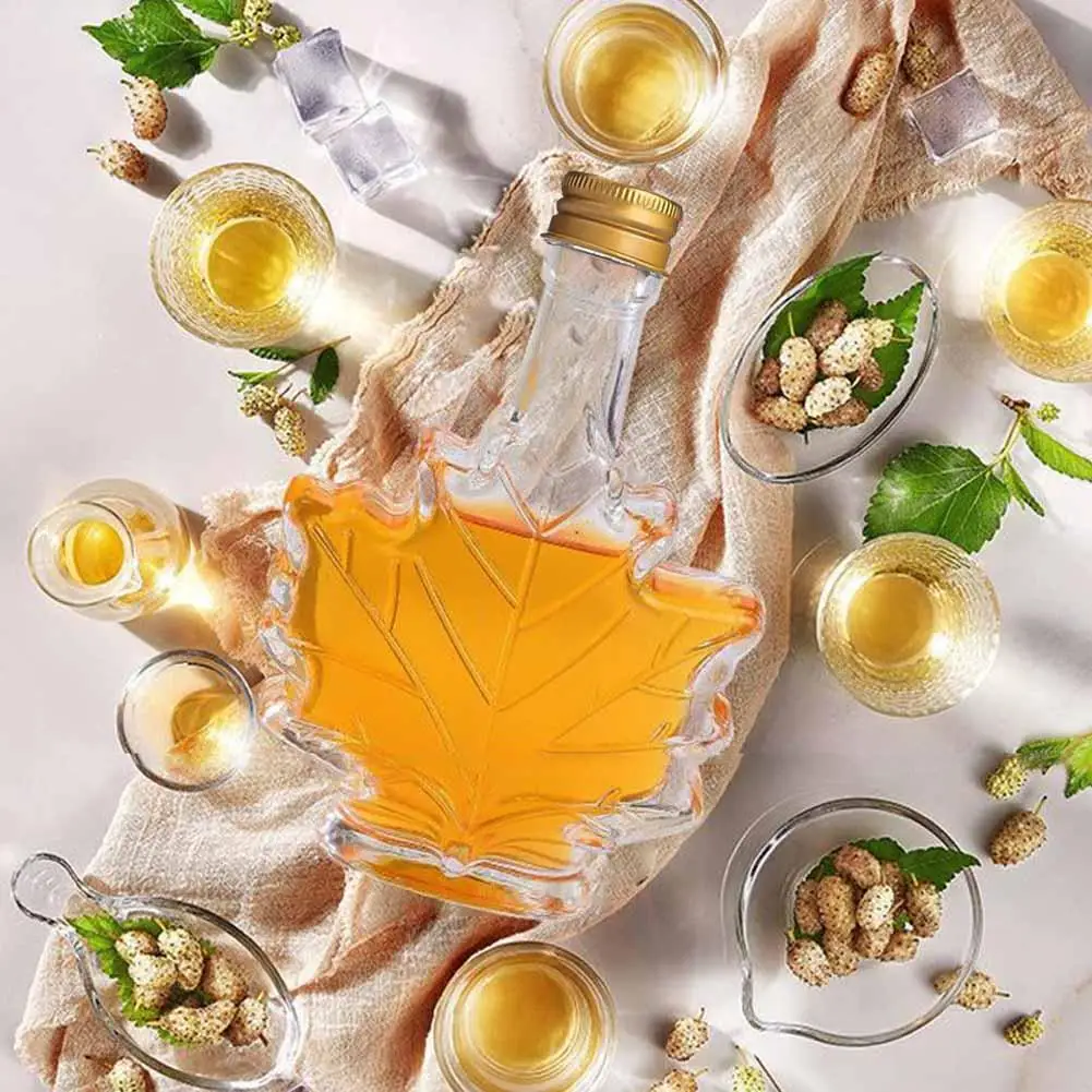 50ml 100ml 250ml Mini Maple Leaf Shape Whisky Alcohol Canning Small Wine Syrup Glass Bottles With Cover For Liquor Scotch