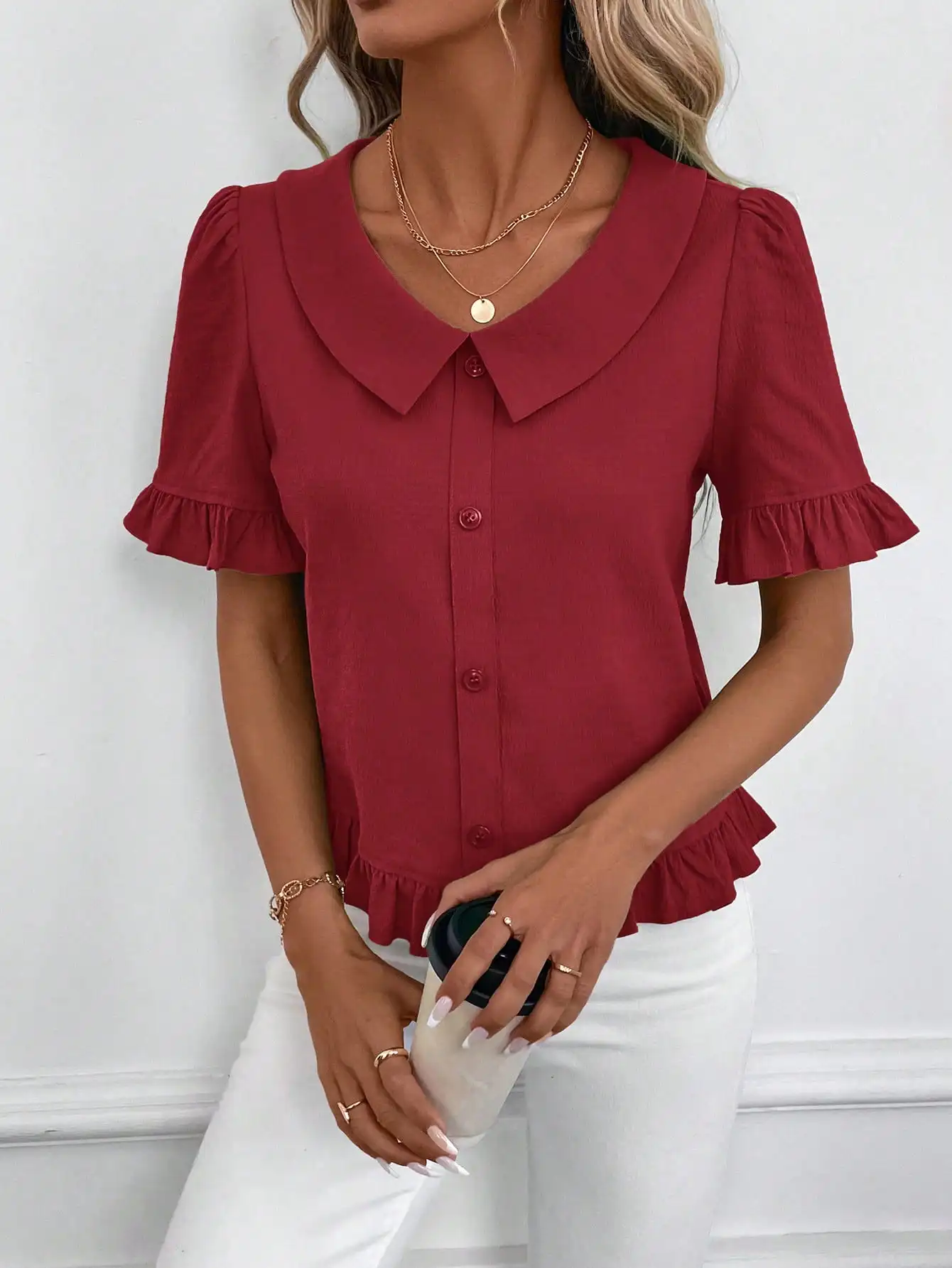 

Женская однотонная блузка с короткими рукавами, пуговицами спереди, рюшами по низу и воротником Питер Пэн.