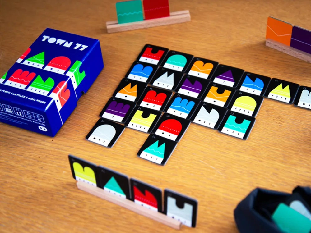 Town 77: The Bilingual Board Game with Multiplayer Poker and Game Collection Cards