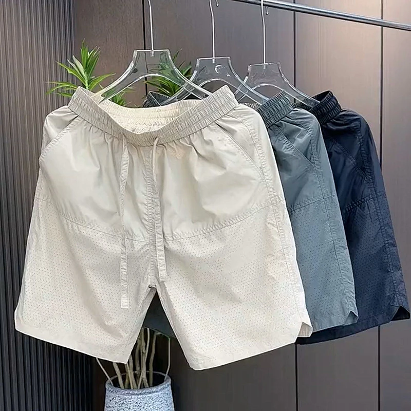 Pantaloni casual da uomo in seta di ghiaccio traspirante vestibilità ampia Qui Dry quattro-cinque lunghezza estate nuovi pantaloni a gamba dritta Sle Faionable