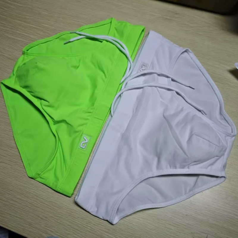 Combination trunks men's low-rise briefs solid color nylon swimming trunks cup anti-embarrassment beach pants tethered BS420