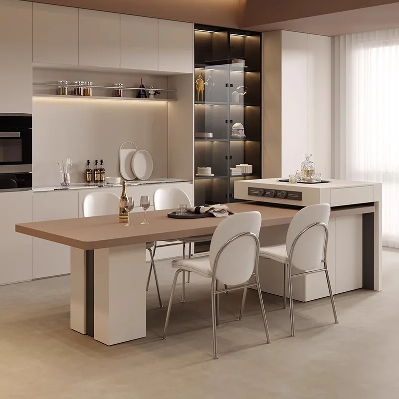 

Минималистичный обеденный стол со встроенной выдвижной столешницей из каменной плиты для больших квартир, элитный, в стиле легкой роскоши, со встроенной платформой.