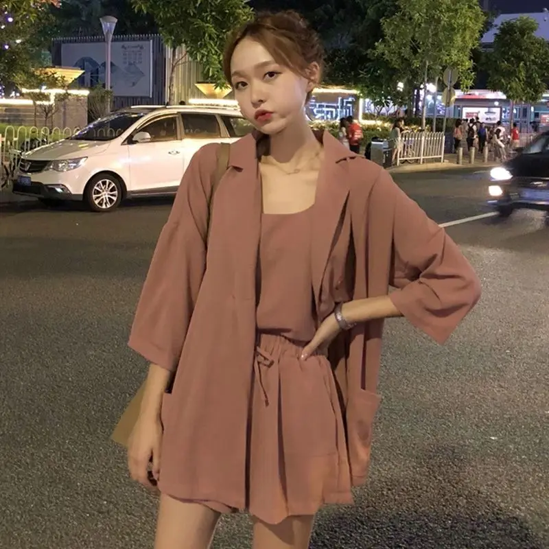 Three piece women\'s Korean version loose fitting new spring and summer small suspender shorts set suit jacket women\'s clothing