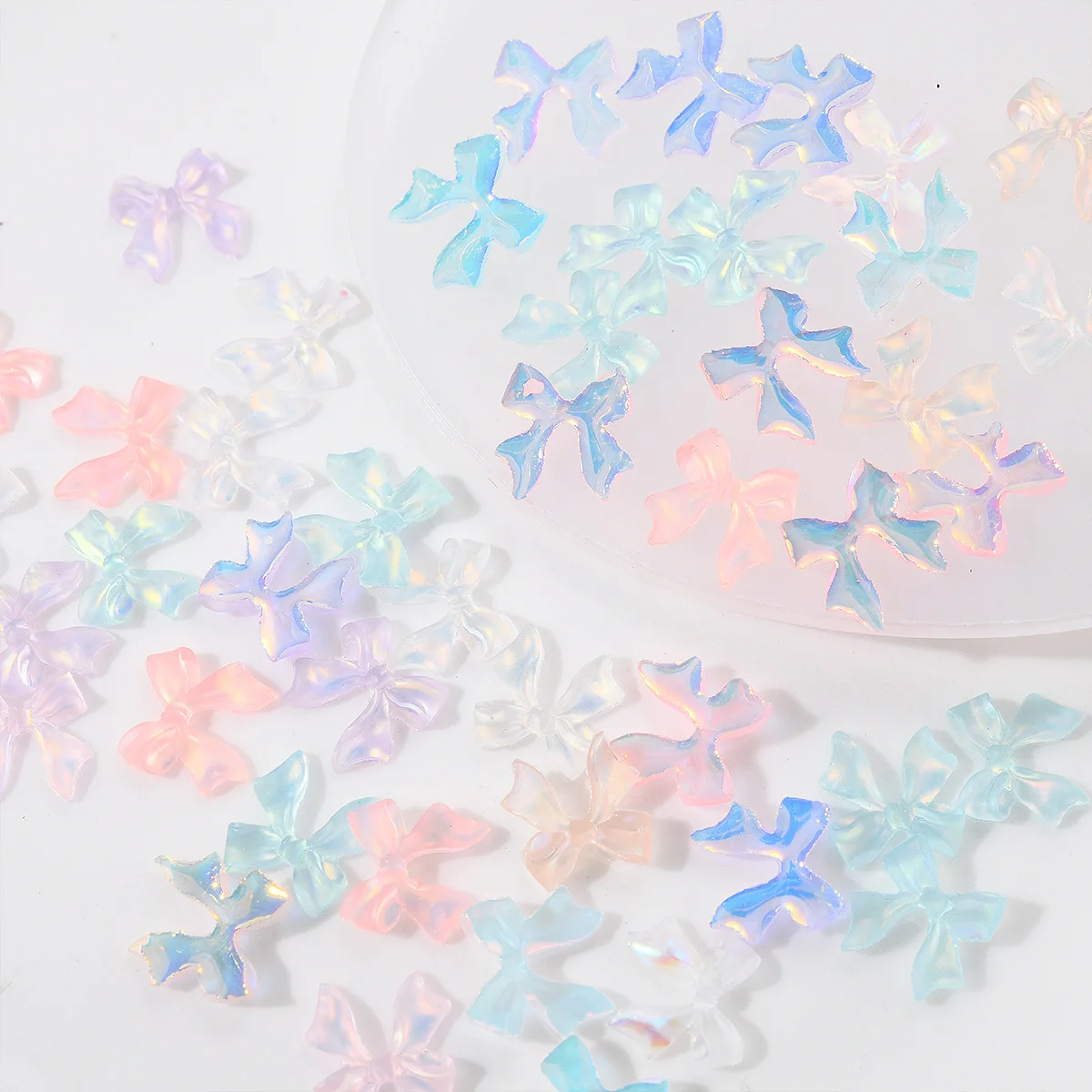 ชาร์มตกแต่งเล็บริบบิ้นออโรร่ามอคค่า 50 ชิ้น คละสี อุปกรณ์ตกแต่งเล็บ 3 มิติ เรซิ่น ประดับเล็บ อุปกรณ์ทำเล็บ