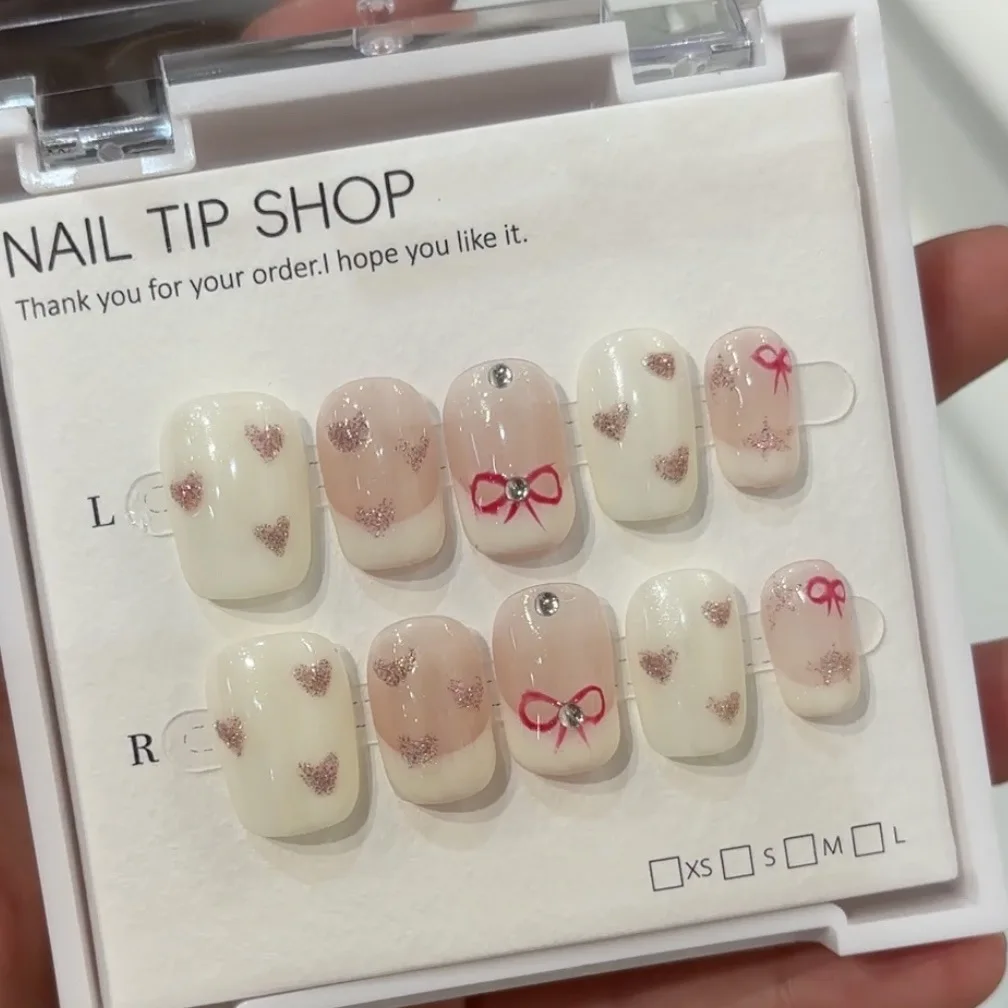 10 piezas de uñas postizas francesas de Color desnudo hechas a mano con purpurina fina lazo de corazón blanco lechoso parches extraíbles