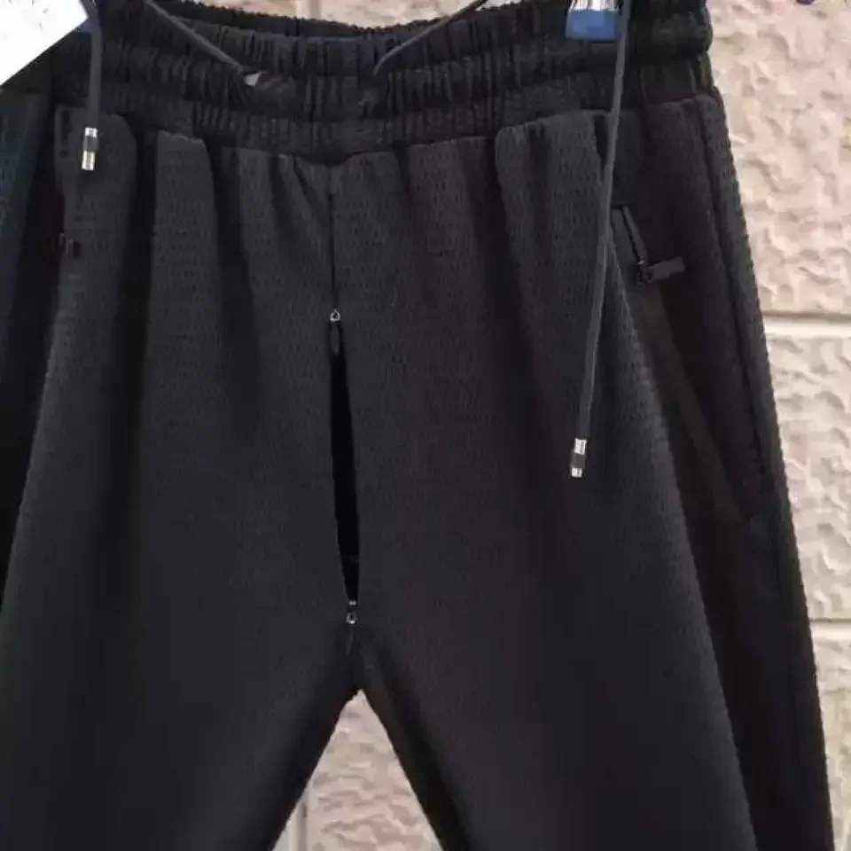 Pantaloni estivi da uomo con apertura sul cavallo Pantaloni sottili per aria condizionata Pantaloni casual grandi traspiranti Fibra di viscosa sottile elastica