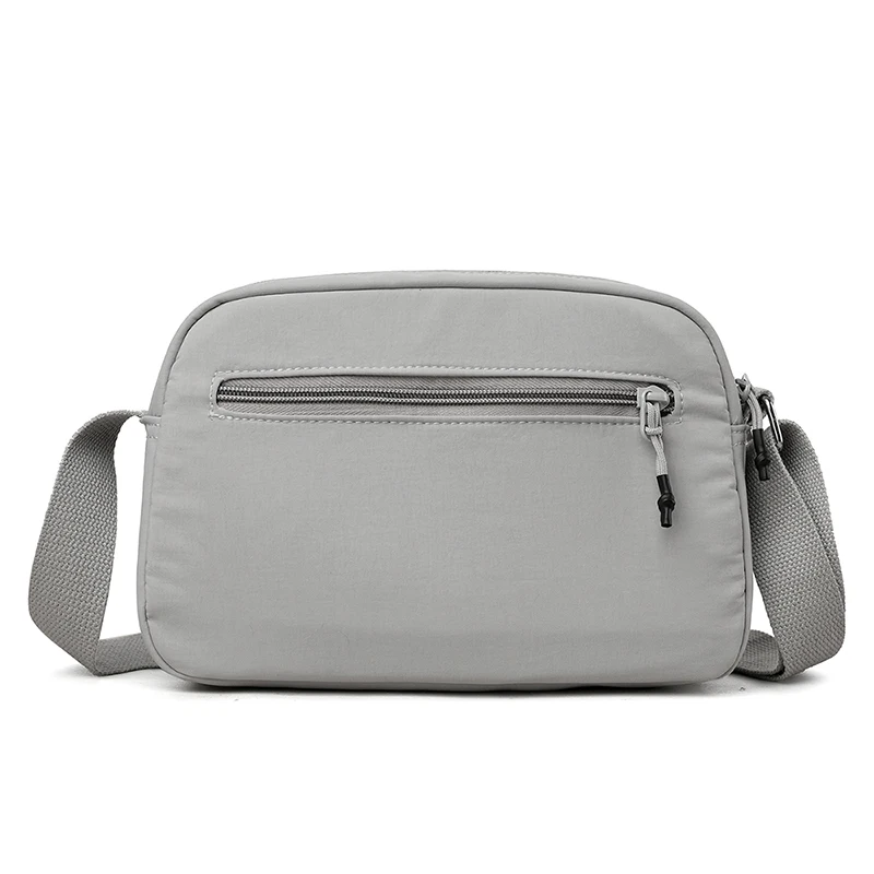 النسخة الكورية الجديدة حقيبة قماش نايلون ملونة معكرون متعددة الاستخدامات للسفر حقيبة مربعة صغيرة حقيبة كروسبودي حقيبة كتف حقيبة نسائية