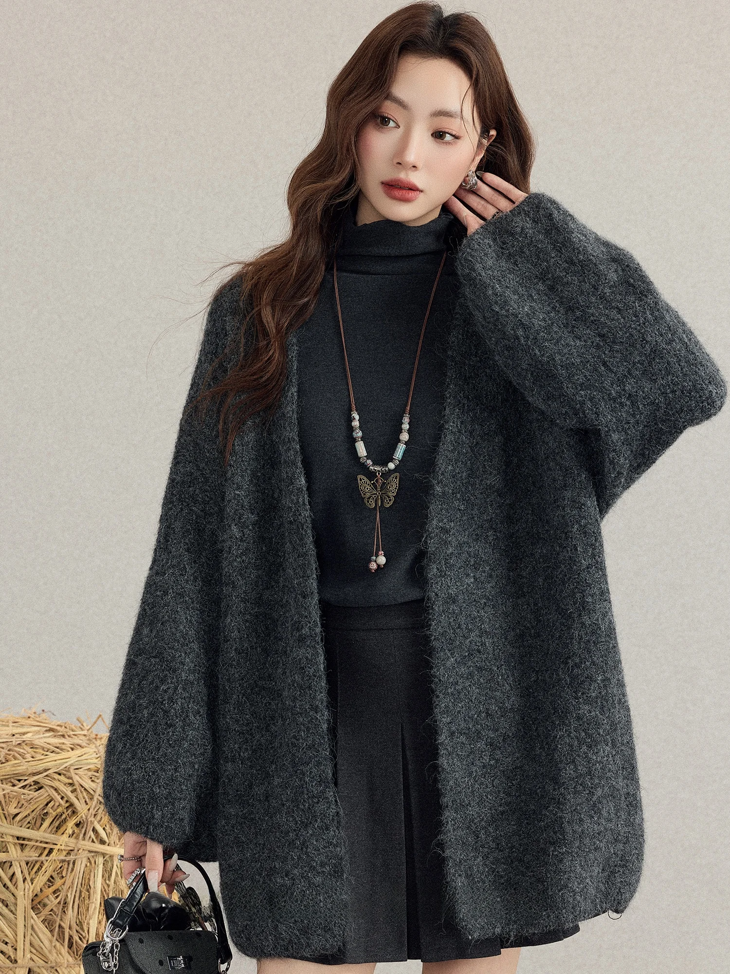 

Женский вязаный кардиган свободного кроя на осень-зиму, удлиненный, с рукавами-фонариками, теплый, средней длины, на пуговицах