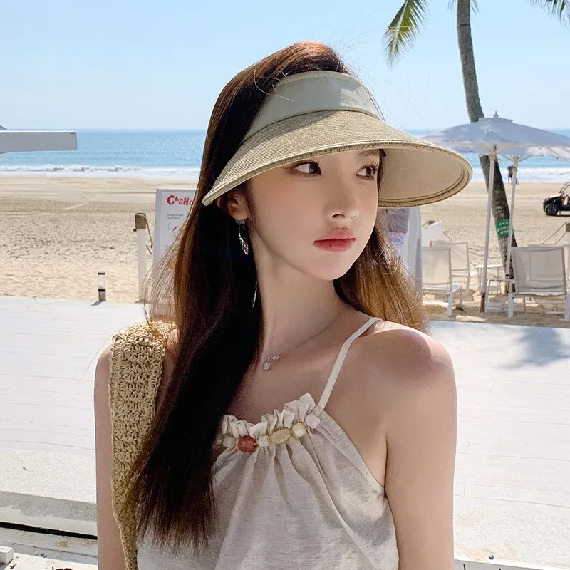 Elegant thatched top hat with a large brim vacation style and