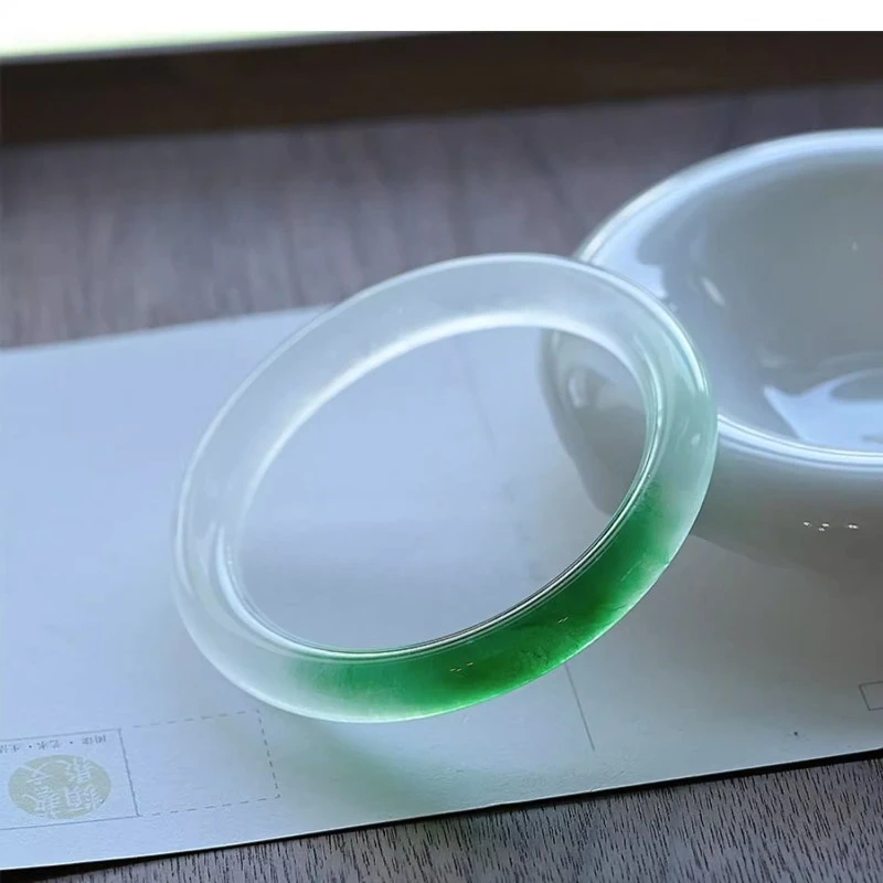 Ice-seed Floating Jade Bracelet with Green Water and Green Foam on White Background Round Retro Quartzite.