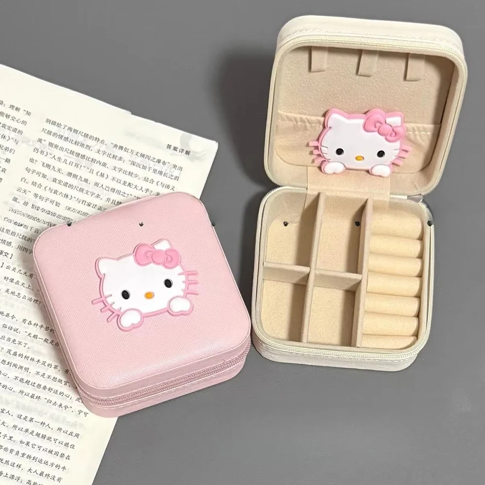 กล่องใส่เครื่องประดับแมวน่ารักสีชมพู Sanrio รุ่นใหม่ ขายดี พกพาสะดวก กล่องเก็บแหวน ต่างหู กล่องเก็บอุปกรณ์เสริมขนาดเล็กพกพาสำหรับเดินทาง