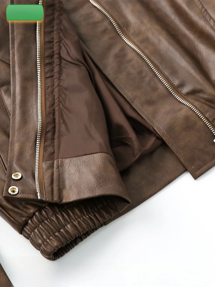 เสื้อแจ็คเก็ตหนังสีน้ำตาลสำหรับผู้หญิง รุ่นใหม่ปี 2025 สไตล์อเมริกันทรงหลวมแบบนักขี่มอเตอร์ไซค์ หรือ สไตล์เรโทรหนังนิ่ม สำหรับฤดูใบไม้ผลิและฤดูใบไม้ร่วง