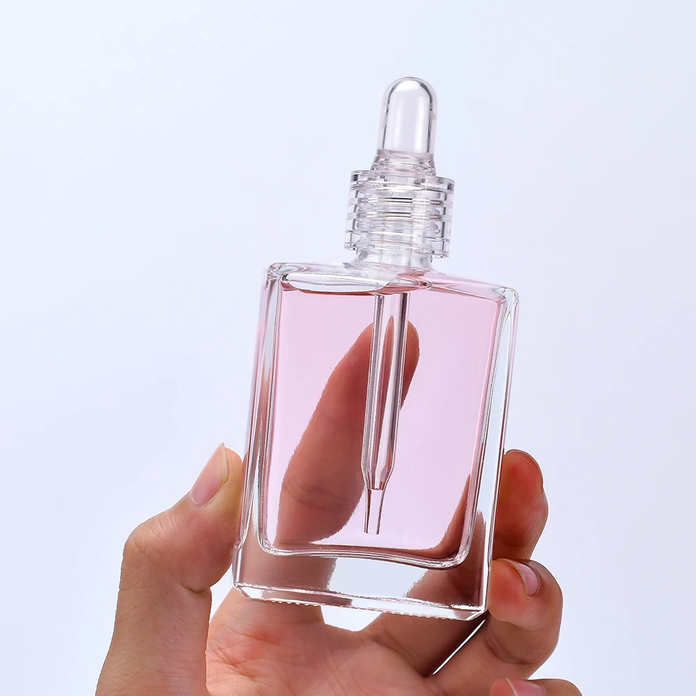 New Trends Wholesale 15ml 30ml 50ml 100ml Cosmetic Package Square Shape Clear serum essential oil Glass Dropper Bottle