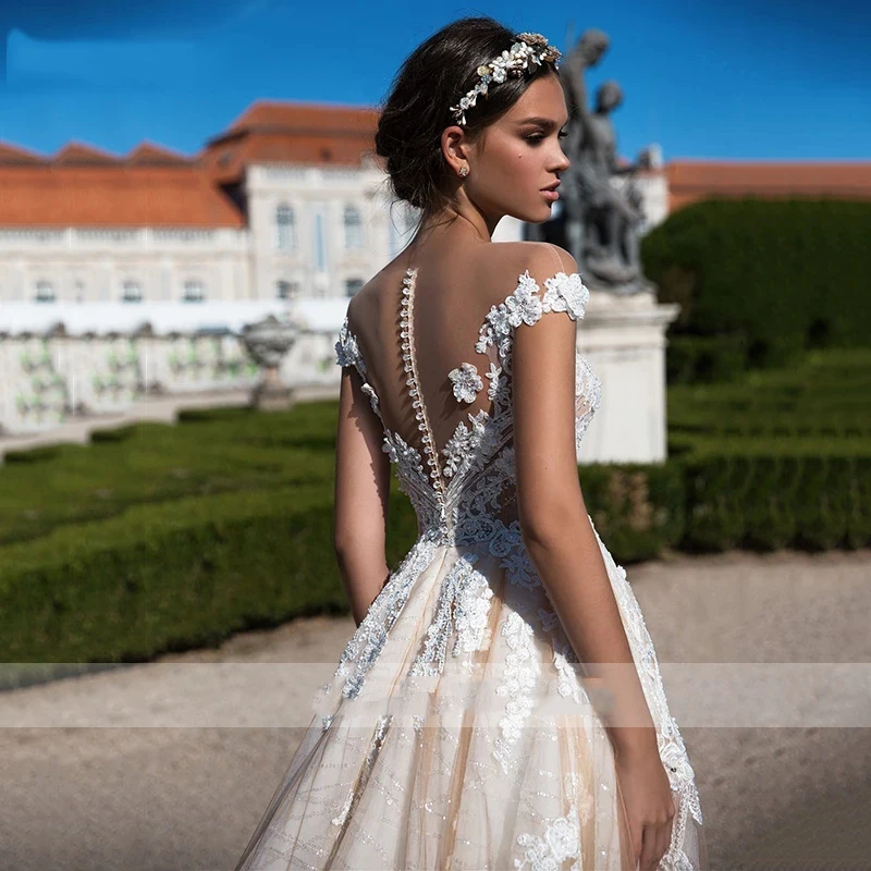 セクシーでゴージャスな A ラインのウェディングドレス女性のエレガントで甘いビーズレースアップリケブライダルドレスプリンセスビーチパーティーボール