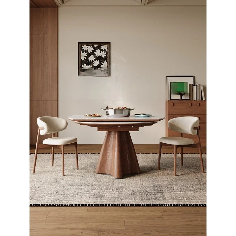 

Retractable folding travertine rock slab dining table with hidden induction cooker