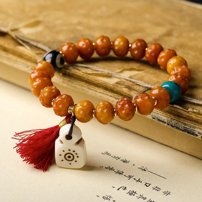 Tibetan- bone meteorite bead with small pendant and side-hanging, ethnic style bracelet
