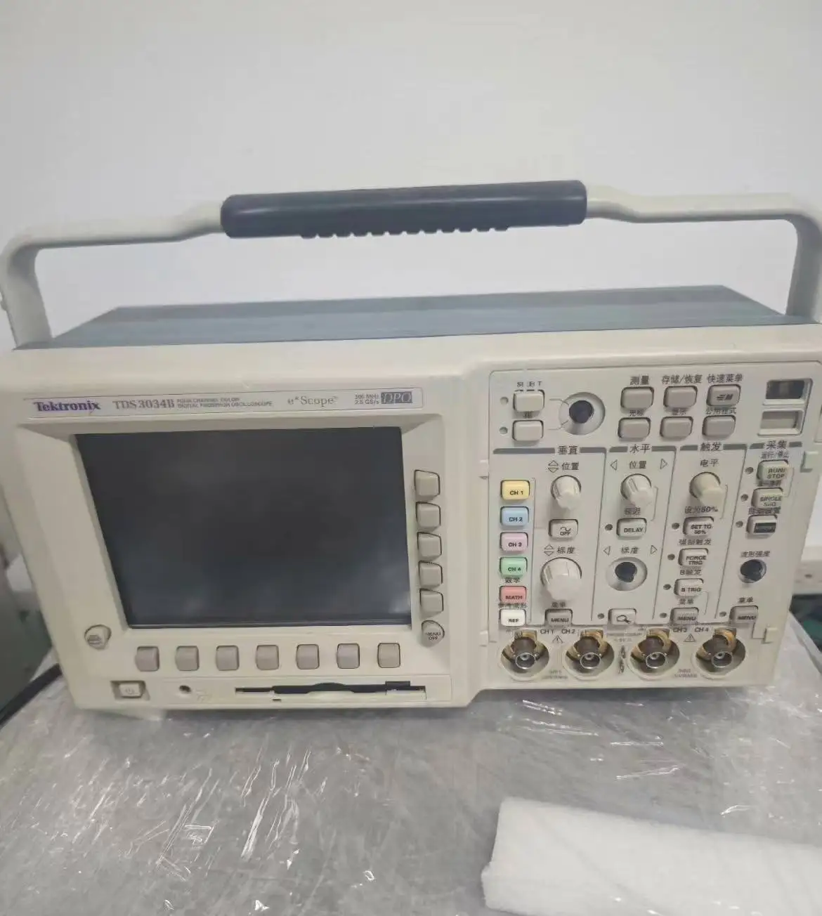 Tektronix TDS3034B 300 MHz, 2.5GS/s 4-Ch Digital Phosphor Oscilloscope DPO/