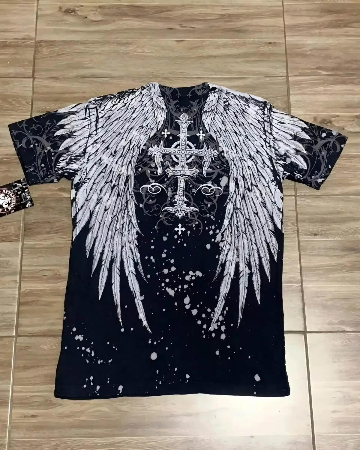 Sommerliche europäische und amerikanische Mode: Atmungsaktives und bequemes Herren-T-Shirt mit Rundhalsausschnitt und Flügel-Kreuz-Print für Outdoor-Aktivitäten.