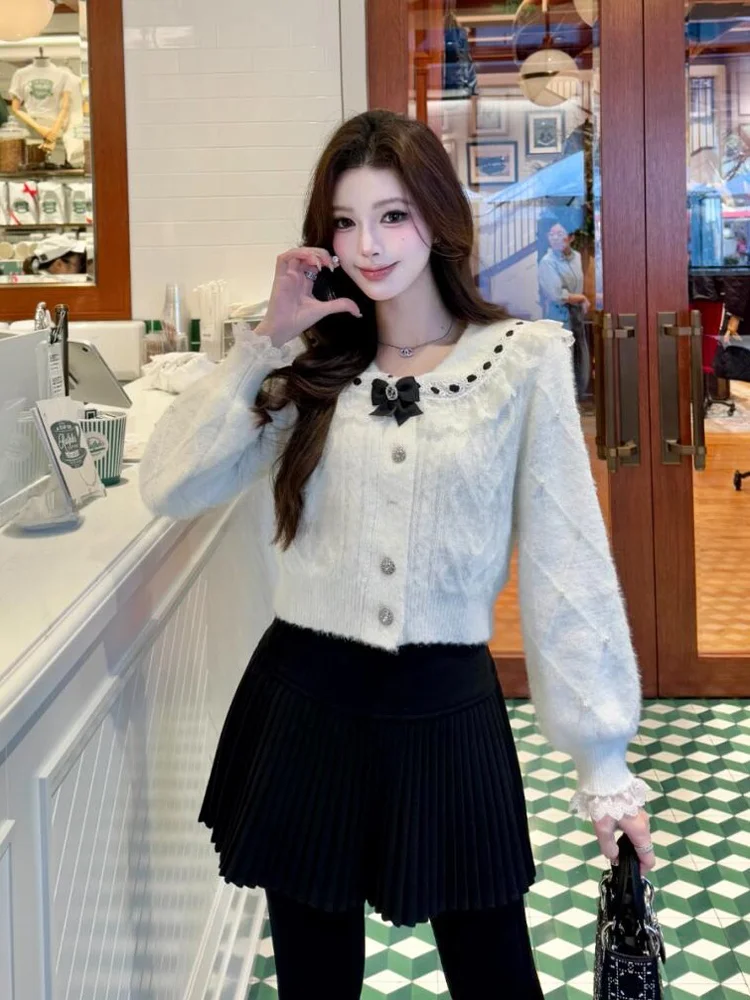 

Sweet Ele Ladylike Knitted Cardigan with Lace Trimmed Peter Pan Collar And Knot for Women Commute Sle Regular...
