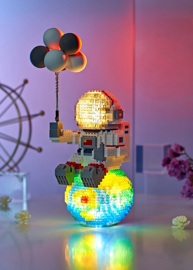 Esploración espacial Micro bloque de diamante astronauta con figura de globo construir ladrillo juguetes educativos colección luz Nanobrick