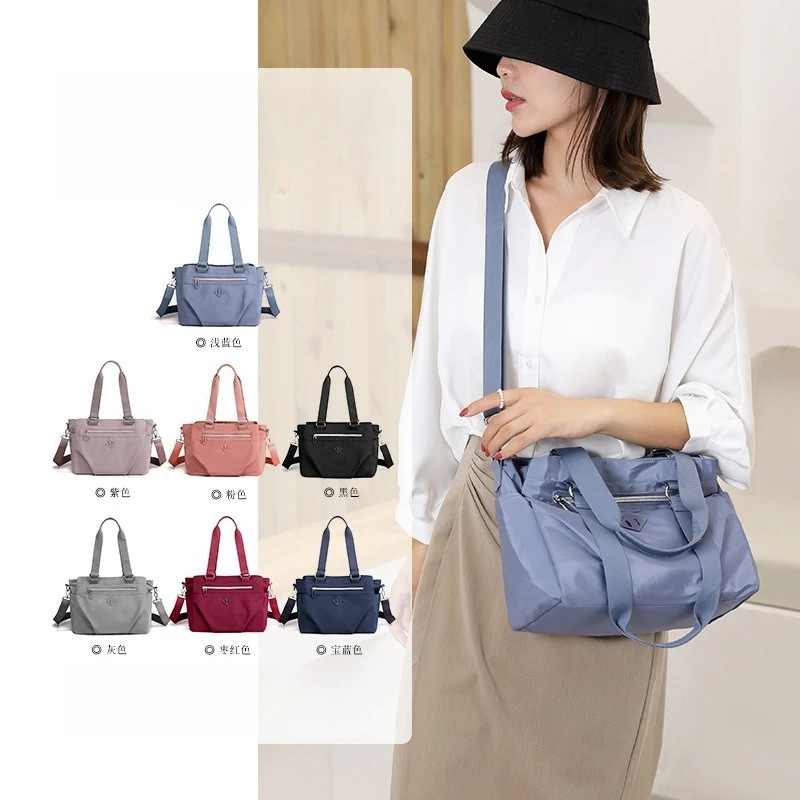 

Women's bag new nylon cloth thin waterproof shoulder bag large capacity multi-layer portable diagonal backpack