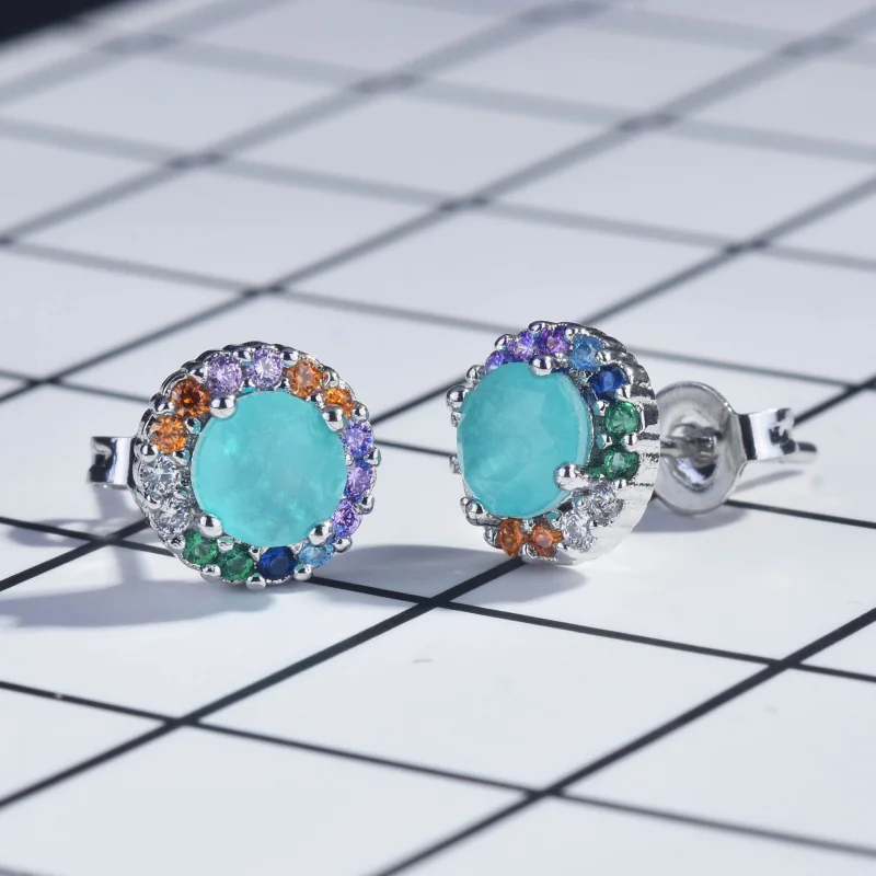 

Silver round colorful zirconia stud earrings, suitable for women to wear. They are fashionable wedding souvenirs or anniversary