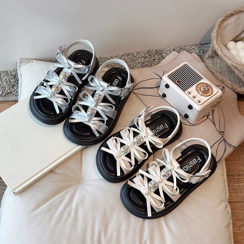 

2025 Summer New Children's Sandals with Bow Fashion Princess Shoes Suitable for Holiday Open-toe Hollow Rhinester Sandals