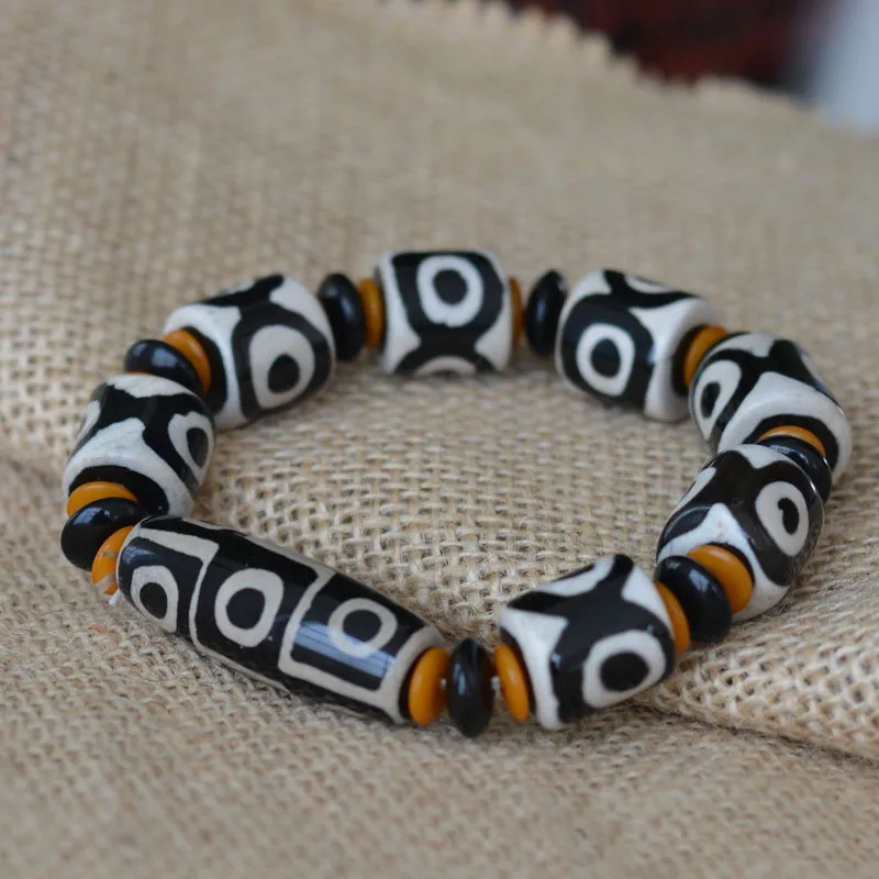 

Natural Tibetan Agate Three Eye and Nine Eye DZi Beads Bracelet, Men's and Women's Ethnic Style, Simple and Versatile Bracelet