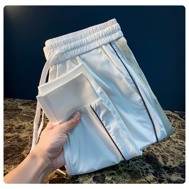 

ce silk pants men's 2025 new high-end fast drying sports breathable ankle tied casual pants