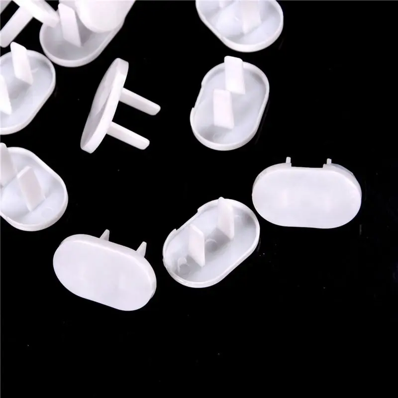 Hot 50Pcs Anti Electric Shock Plugs Protector Cover Cap Power Socket Electrical Outlet Baby Children Safety Guard Two Holes