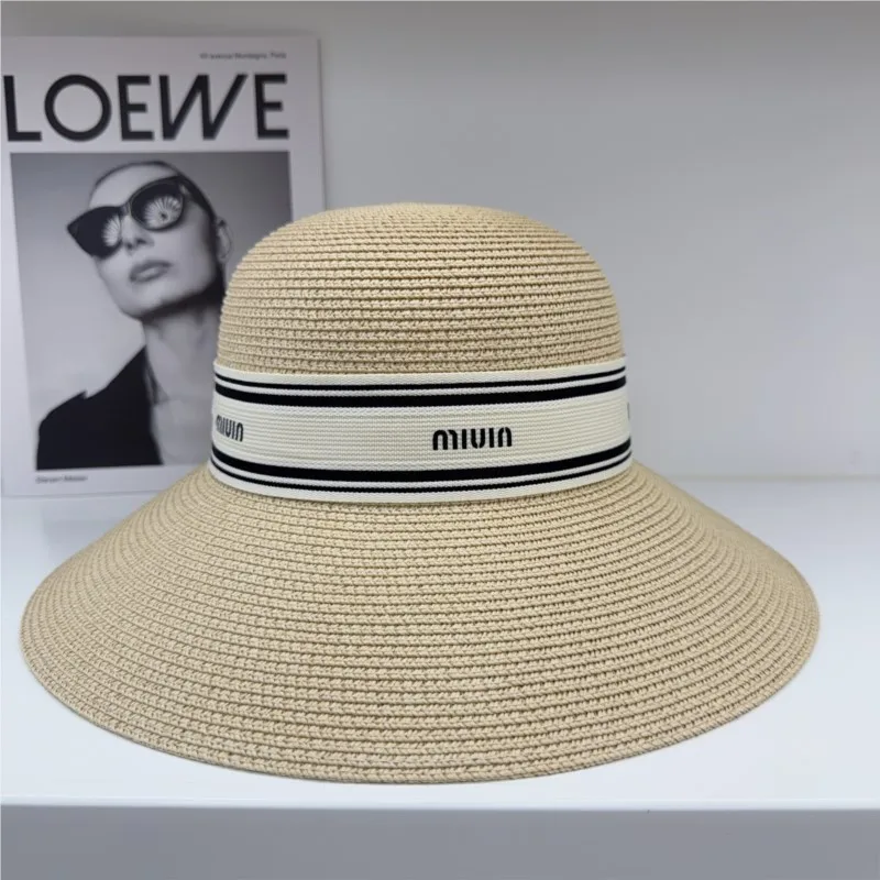 Hepburn style wide-brimmed hat women's face-enhancing small seaside vacation and outing fisherman's