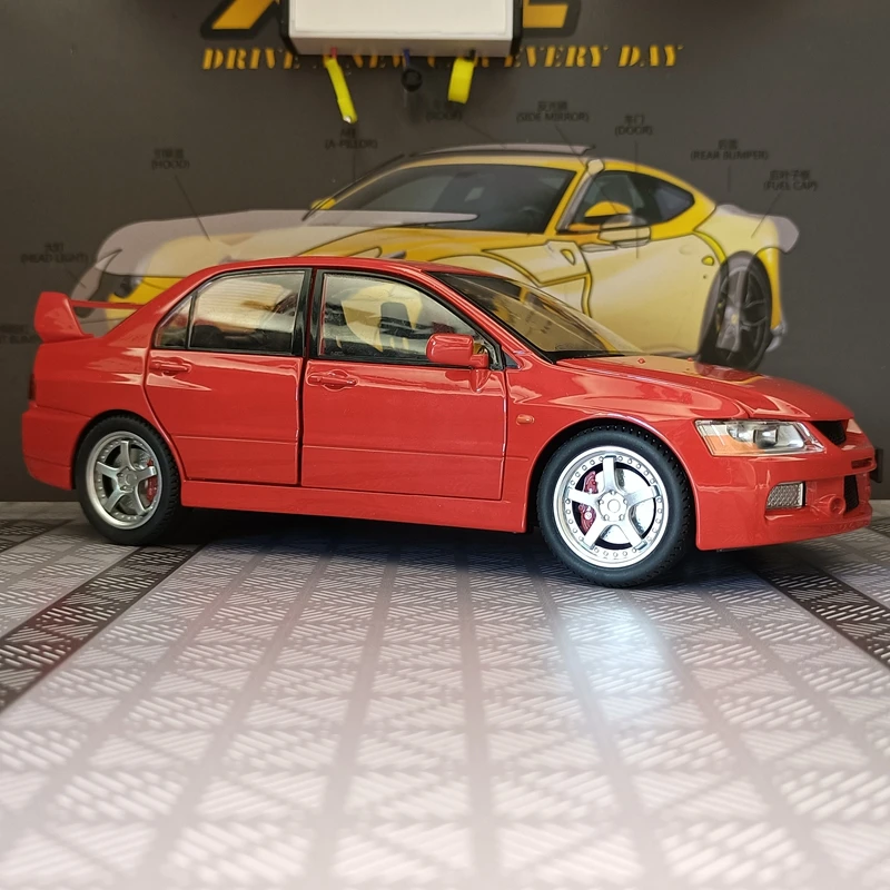 

1:24 Mitsubishi EVO 9th generation alloy racing model doors on both sides that and the front hood and trunk door can be opened
