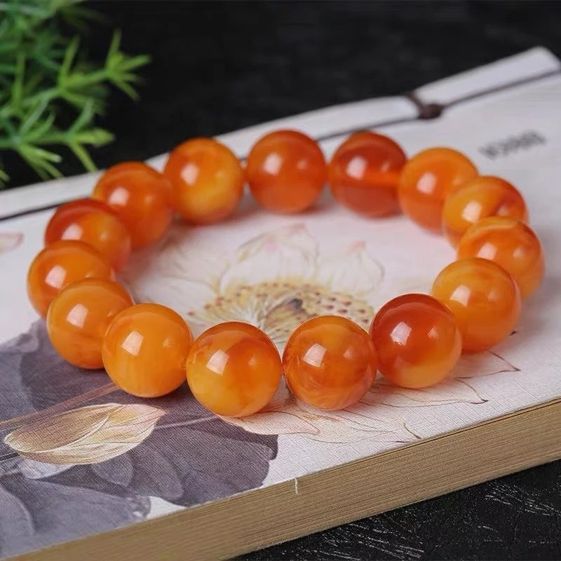 Authentic bracelet, genuine natural with floral patterns, old in chicken oil yellow color, amber brace