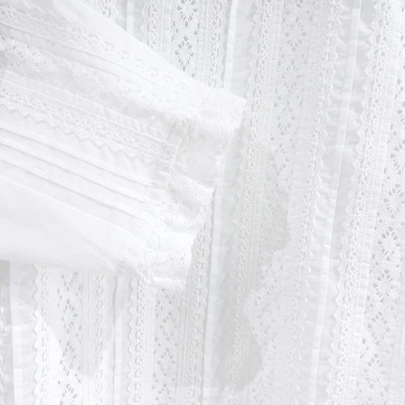 Damska nowa koszula z koronkowymi wstawkami na wiosnę i lato 2026, elegancka bluzka biurowa z długim rękawem i ażurowymi detalami.