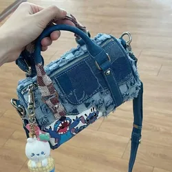 Stitch women's new fashion versatile personality creative cartoon pattern large capacity storage denim hole stitching handbag